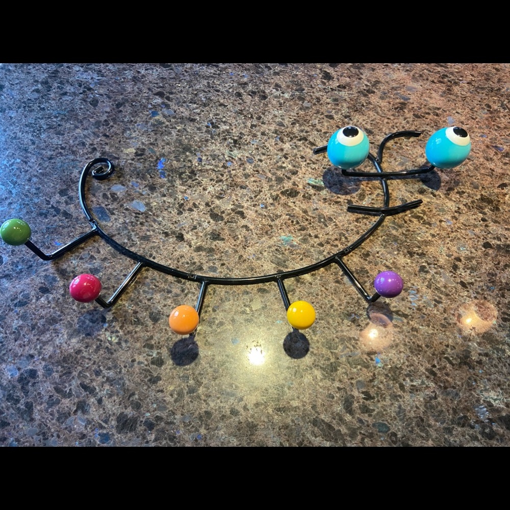 “Bug” coat/backpack/leash rack